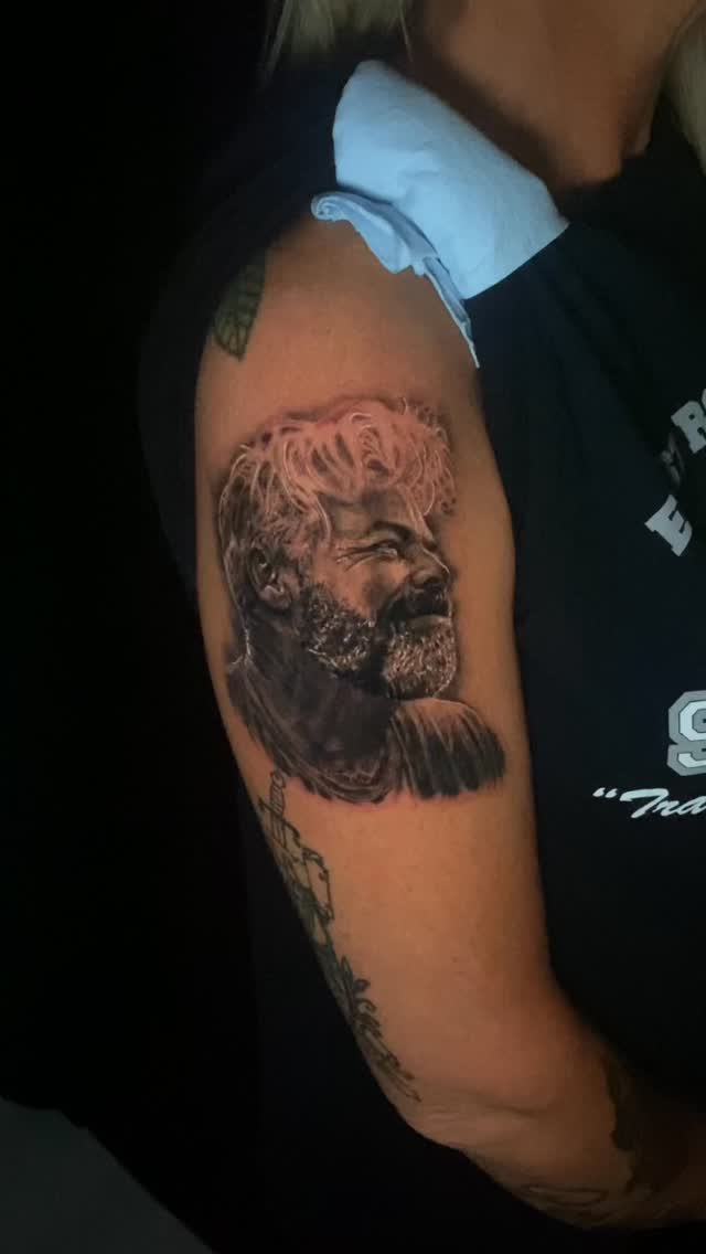 Video by Elvis Lee Martin on June 25, 2026. May be an illustration of one or more people, tattoo and text.